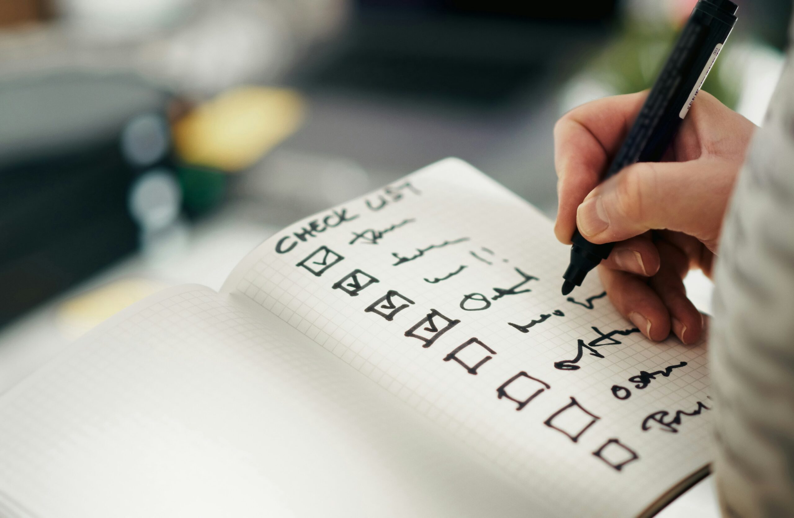 Business owner reviewing an AI readiness checklist with their operations manager